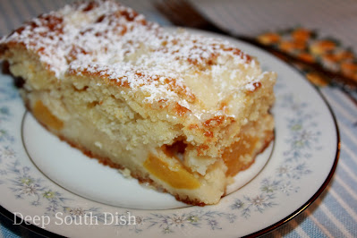 A super easy, sour cream snack cake with peaches.