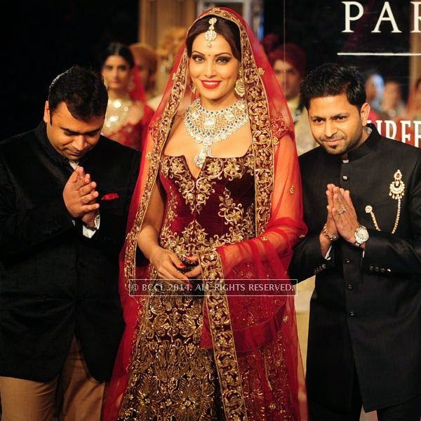 Bollywood actress Bipasha Basu walks the ramp for Shree Raj Mahal Jewellers on Day 6 of India Couture Week, 2014, held at Taj Palace hotel, New Delhi.