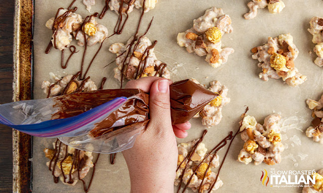 slow cooker candy drizzled with chocolate