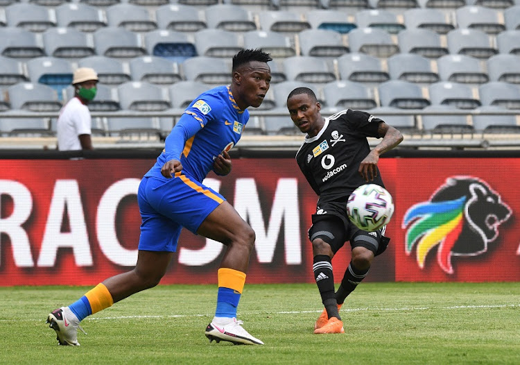 Philani Zulu of Kaizer Chiefs challenges Thembinkosi Lorch of Orlando Pirates during the 1st Leg of the MTN8 Semi Final match between Orlando Pirates and Kaizer Chiefs at Orlando Stadium on October 31, 2020 in Johannesburg, South Africa.