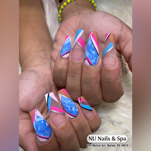 NU Nails & Spa logo