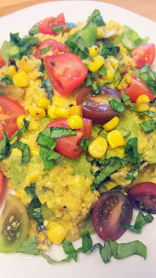 Ravioli with Corn Sauce Recipe with Basil and Grape Tomatoes. The corn sauce is almost like a pesto but with corn and toasted almonds instead