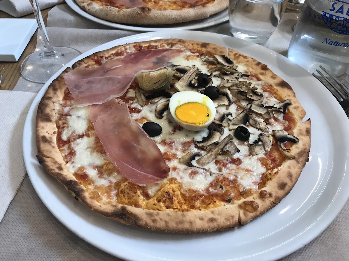 And the egg was terribly over cooked. I had better pizza in other places.