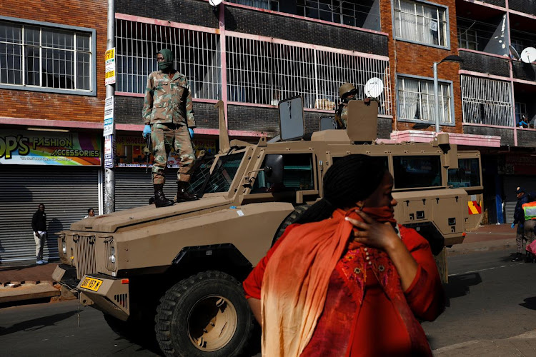 Members of the South African Defence Force patrolled in Yeoville Johannesburg central during a joint operation with the South African Police Services on day 31 of the national lockdown on April 26 2020.