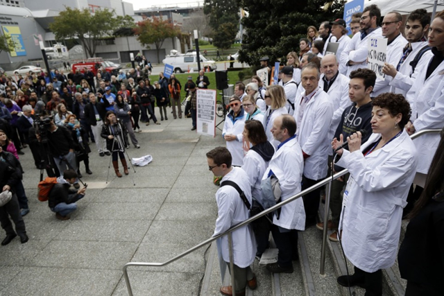 Naomi Oreskes, bottom right with microphone, a history of science professor at Harvard University, addresses the crowd during a rally by scientists in conjunction with the American Geophysical Union's fall meeting in San Francisco, 13 December 2016. Photo: Marcio Jose Sanchez / AP