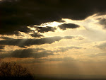 Sun bursting through the clouds, Washington Monument State Park in Boonsboro, Maryland.