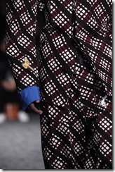 MILAN, ITALY - JANUARY 13:  A model, detail, walks the runway at the Marni show during Milan Men's Fashion Week Fall/Winter 2018/19 on January 13, 2018 in Milan, Italy.  (Photo by Pietro D'Aprano/Getty Images for Marni)