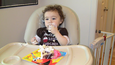 Phoenix eating birthday cake.