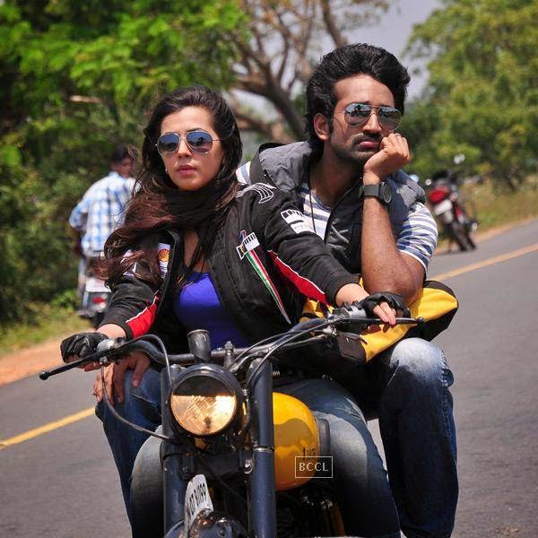 Aadhi and Nikki in a still from Tamil movie Yagavarayinum Naa Kaakka. (Pic: Viral Bhayani) 