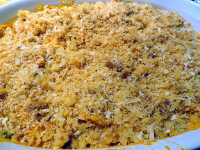 Pumpkin Mac and Cheese Recipe: After making the cheese sauce, stir it into the pasta until well mixed, then pour into a baking dish and top with a mix of parmesan, walnut, panko and breadcrumbs