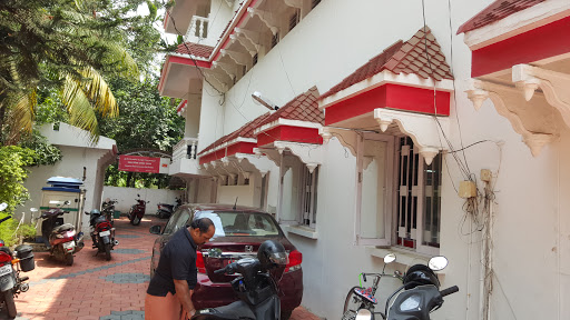 Guruvayoor Post Office, Inner Ring Rd, Kuppaayil, Guruvayur, Kerala 680101, India, Shipping_and_postal_service, state KL