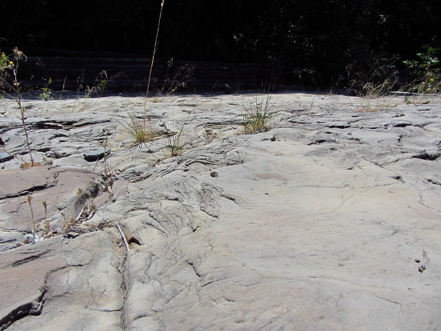 layers of sandstone eroded into swirl-like patterns