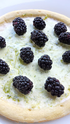 Blackberry Pizza recipe. Add the creme fraiche, then mix in the pesto. top with the blackberry