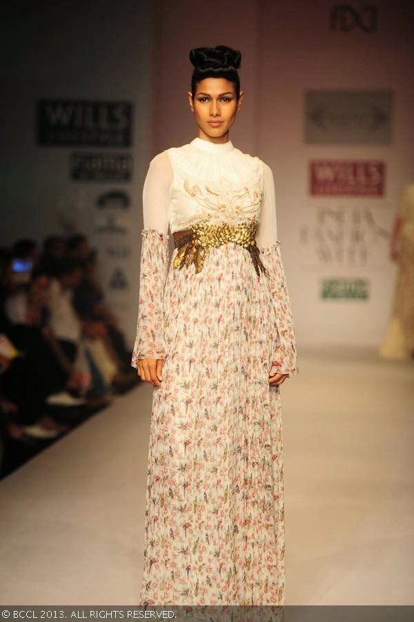 Nethra Raghuraman showcases a creation by fashion designer Sulakshana on Day 5 of Wills Lifestyle India Fashion Week (WIFW) Spring/Summer 2014, held in Delhi.