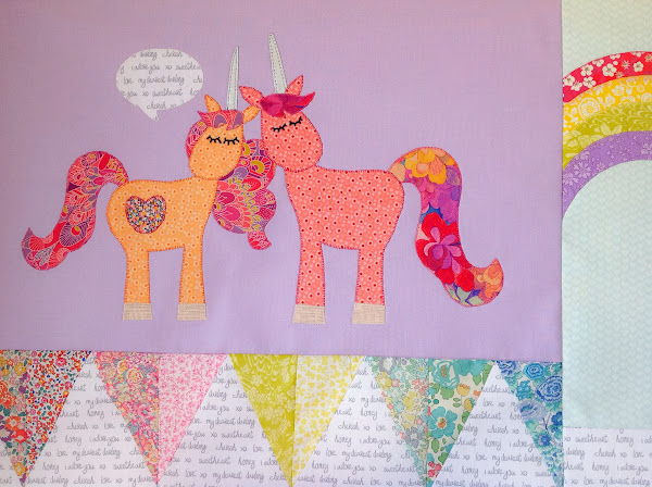 Two unicorns talking quilt applique block