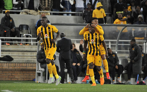 George Lebese of Kaizer Chiefs celebrates scoring his second goal with Camaldine Abraw of Kaizer Chiefs during the Absa Premiership match between SuperSport United and Kaizer Chiefs at Peter Mokaba Stadium on September 12, 2015 in Polokwane, South Africa.