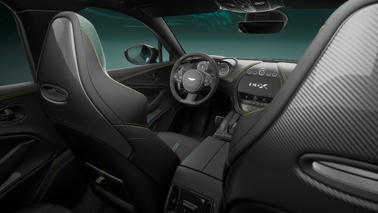 Semi-aniline leather seats are offset by lime green contrast stitiching.