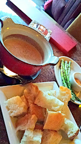 Urban Fondue menu, Ruby Port Cheese Fondue with white cheddar, Swiss and Gruyere cheeses, finished with caramelized sweet onions and port wine