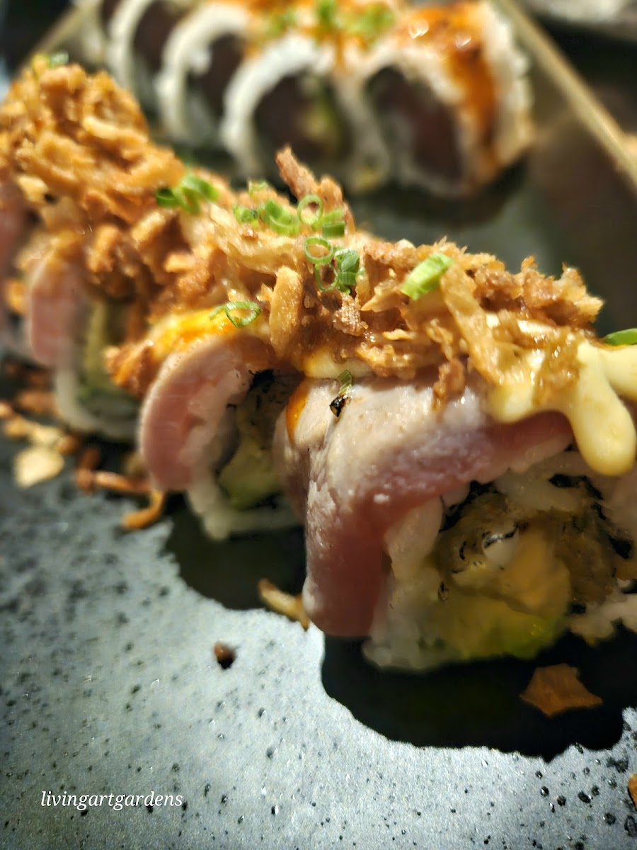 Dynamite roll with crunchy onion topping