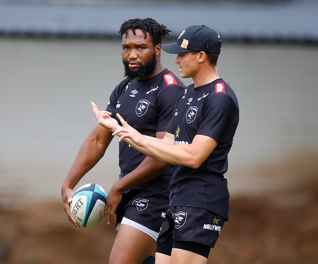 Lukhanyo Am, left, with Curwin Bosch during the training session at Kings Park Stadium on November 14, 2023.