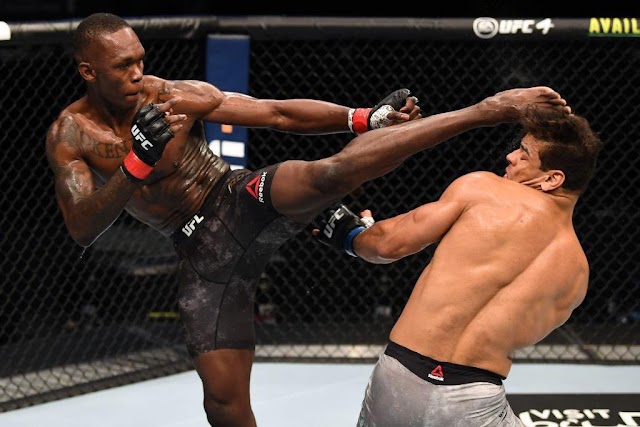 Nigerian MMA fighter, Israel Adesanya knocks out Paulo Costa to retain his UFC middleweight title (ptotos)