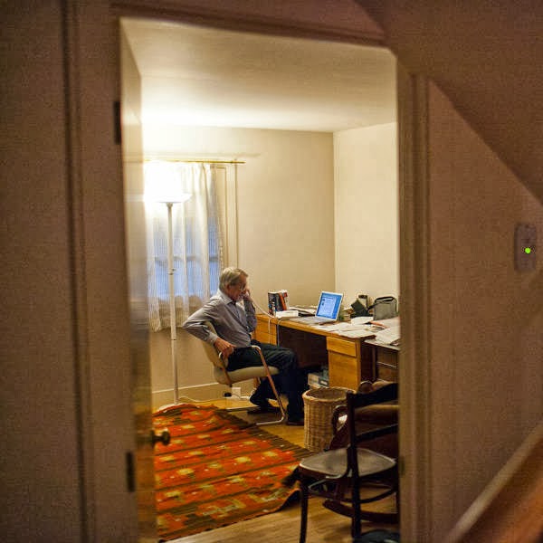 Martin Karplus speaks on the phone after winning the 2013 Nobel Prize for chemistry, at his home in Cambridge, Massachusetts.