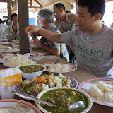 The green dish is a sour soup made with lemongrass, tumeric, galangal and local vine (Thai = pak chiang dah)