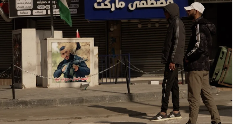 Jenin's walls are covered with the pictures of young armed men killed by Israeli forces