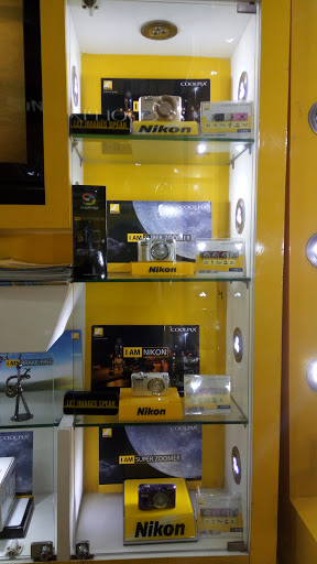 Nikon Experience Zone, Shop No. 114, First Floor, Vikas Surya Shooping Mall, Mangalam Palace, Sector-3, Rohini, New Delhi, Delhi 110085, India, Camera_shop, state DL