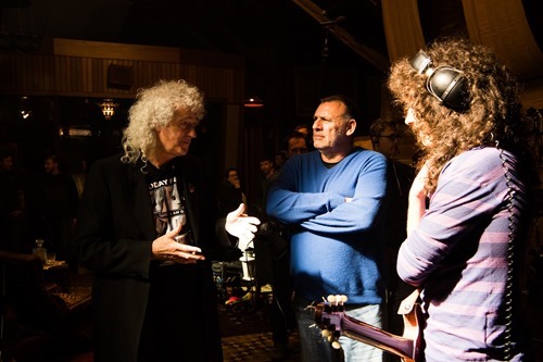 L-r, Brian May, Producer Graham King and Gwilym Lee on the set of Twentieth Century Fox's "Bohemian Rhapsody."