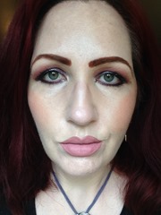 wearing NYX Cosmetics High Definiton Foundation in Nude