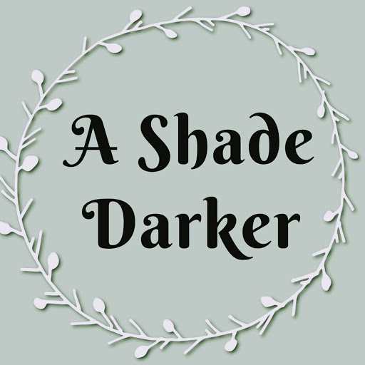 A Shade Darker logo