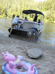 all aboard...leaving the beach crowd behind