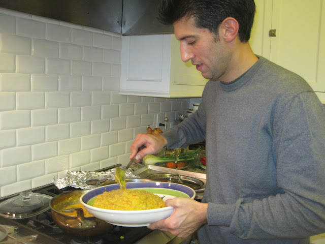 host serving up some risotto