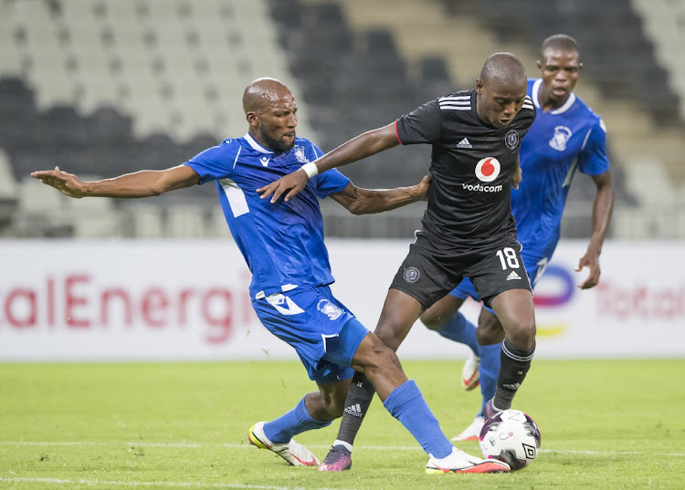 Sikhumbuzo Magagula of Royal Leopards and Kabelo Dlamini of Orlando Pirates during the CAF Confederation Cup 2021/22 game between Royal Leopards and Orlando Pirates.