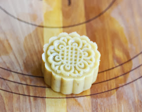 step by step photo showing the dough with the decorative stamp on top