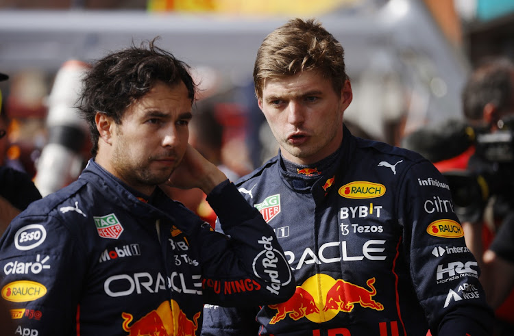 Red Bull’s Max Verstappen, right, celebrates after winning the Belgian Grand Prix with teammate Sergio Perez at Spa-Francorchamps on Sunday. Picture: REUTERS/JOHANNA GERON