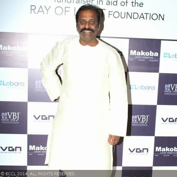 Vairamuthu smiles for the lens as he arrives for an art auction after party, organised by Madras Round Table, held at Hotel Hyatt.