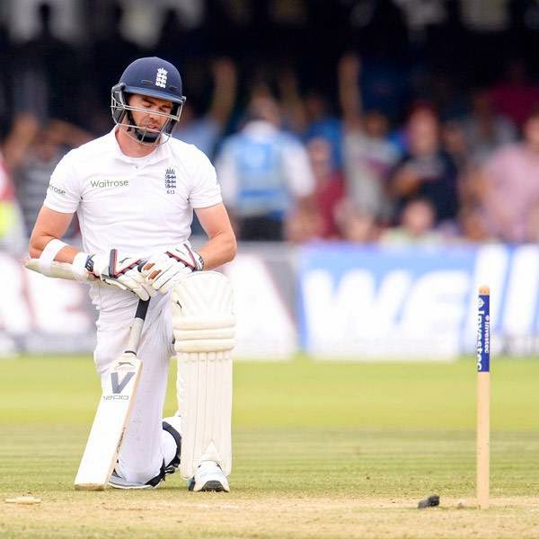  England's James Anderson picks himself off the ground after being run out as India won the second cricket test match at Lord's cricket ground in London July 21, 2014. 