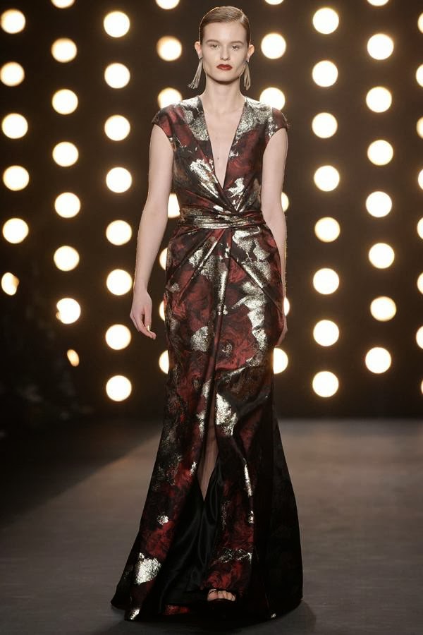 A model presents an outfit by Naeem Khan during the Mercedes-Benz Fashion Week Fall/Winter 2014 shows February 11, 2014 in New York.