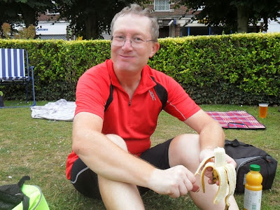 man eating banana