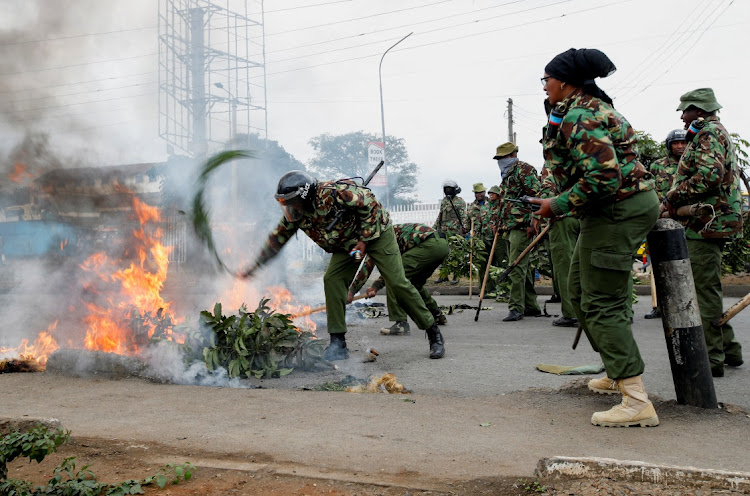 Riot police officers remove a barricade after dispersing supporters of Kenya's opposition leader Raila Odinga during an anti-government protest in Nairobi, Kenya, on July 7 2023. Picture: MONICAH MWANGI/REUTERS