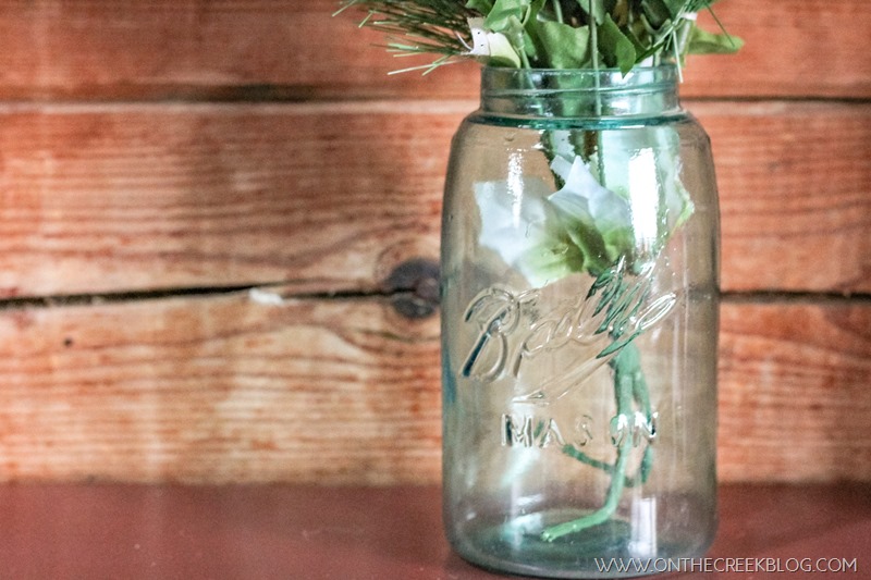 Simple & easy Christmas decorating using old mason jars & Dollar Tree flowers!