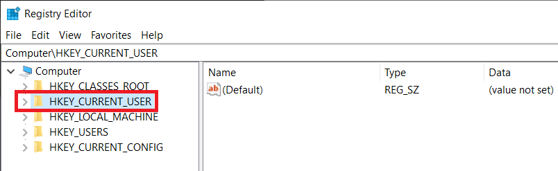 Kliknij strzałkę obok klucza HKEY_CURRENT_USER, aby go rozwinąć