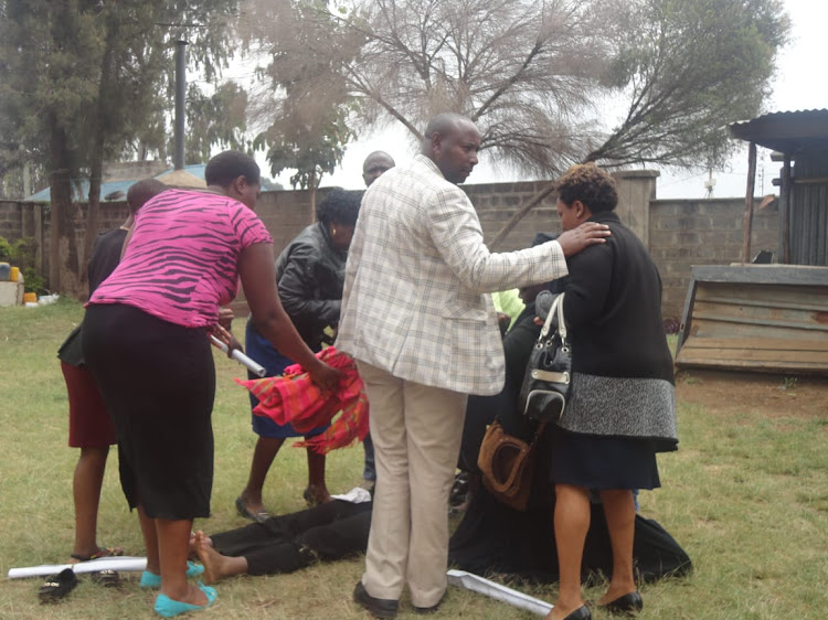 The woman being attended to./CLAUSE MASIKA