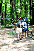 the group pulling him up the zip