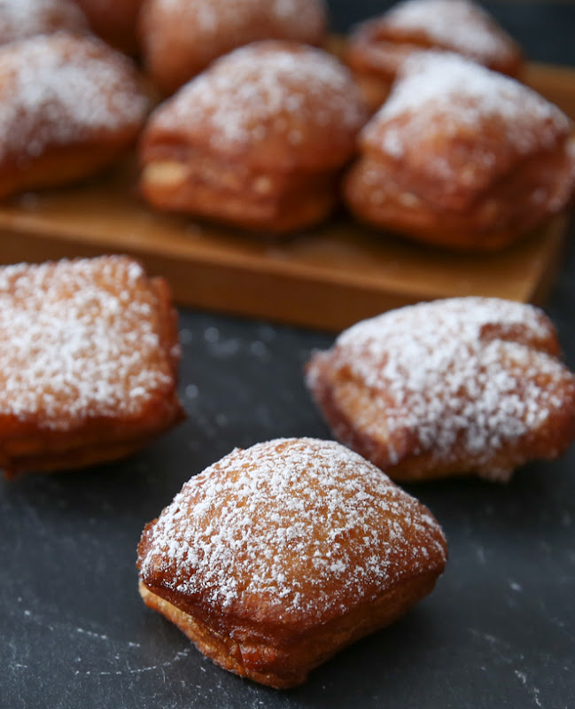 photo of biscuit beignets dusted with powdered sugar