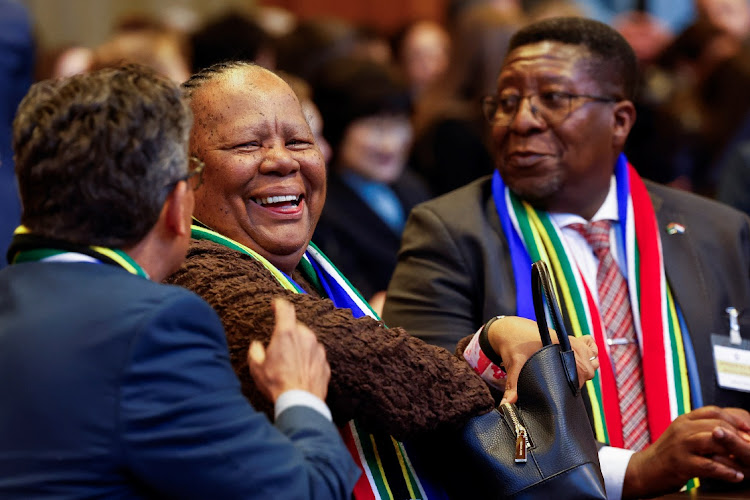 Dirco director-general Zane Dangor speaks as minister Naledi Pandor and South Africa's ambassador to the Netherlands, Vusimuzi Madonsela, react on the day of the International Court of Justice ruling on emergency measures against Israel. File photo.