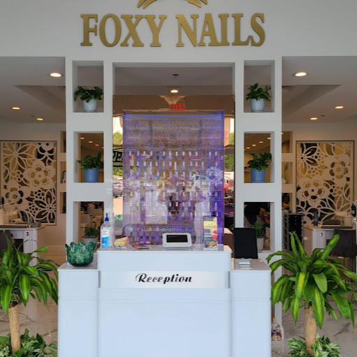Foxy Nails & Spa logo