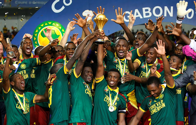 Cameroon players celebrate with the trophy after winning the African Cup of Nations in 2017